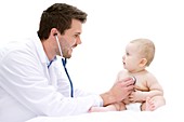 Doctor examining baby with stethoscope