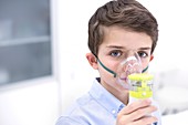 Boy using nebuliser