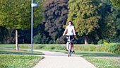 Woman riding bike