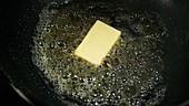 Butter in a pan, high-speed