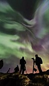 Star gazers watching aurora, timelapse