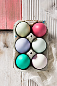 Box of egg coloured with natural dyes