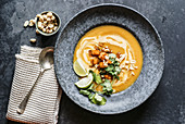 Thai pumpkin soup with limes and peanuts
