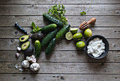Ingredients for tzatziki with avocado and herbs