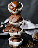 A tower of chocolate muffins