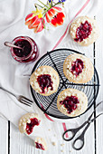 Jam cheesecake and yeast biscuits with sprinkles