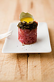 Beef tartar with caviar and a quail egg