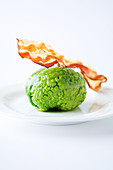 Stuffed savoy cabbage with bacon