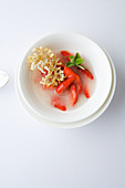 Elderflower soup with strawberries and fried flowers