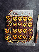 Bars with chocolate icing and salt pretzels