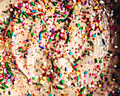 Cake dough with colorful sugar sprinkles