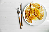 Pancakes with orange confitur