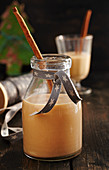 Homemade caramel liqueur with cinnamon, gingerbread spice and rum