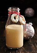 Homemade white chocolate liqueur decorated with meringue rings