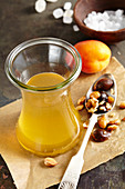 Homemade apricot liqueur with rock sugar and corn schnapps
