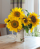 Bouquet of sunflowers in a jug