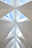 Faceted ceiling with triangular skylights