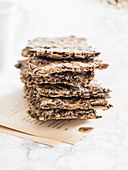 Pile of freshly baked crunchy seed crackers