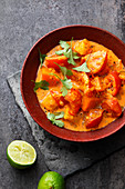 Vegan tomato curry with limes