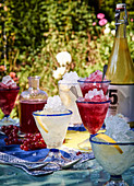 Redcurrant and lemon syrup on crushed ice