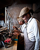 A barista making coffee in Coco Safar (Cape Town, South Africa)