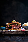 Pastrami sandwich with rye bread and pickles
