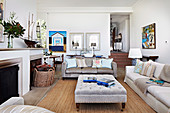 Sitting area in front of the fireplace in the beach house