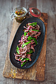 Argentine roast beef salad with mangetout and chimichurri