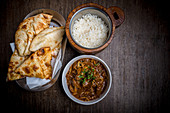 Dhan Sakh with rice and naan (India)