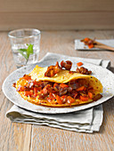 Omelette with red peppers and bacon