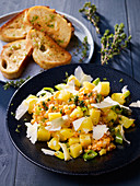 Warm potato salad with red lentils