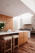 Modern kitchen with built-in furniture made of wood