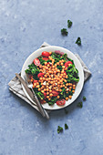 Chickpea, kale and cherry tomatoes salad