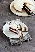 Delicious cake slice over grey concrete table background