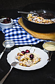Kaiserschmarrn (shredded pancake) with cherries and vanilla sauce (low carb)