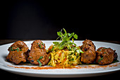 Beef tikka with curried vegetables (India)