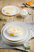 Swiss roll with mandarins and cream