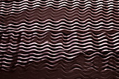 Baking chocolate with a wave pattern (full frame)