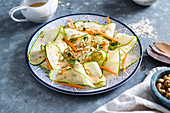 Zucchini salad with carrots and nuts