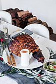 Roast ham on a set table