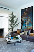 Fashion photography on sofa in living room with Christmas tree