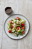 Grilled courgette salad with cherry tomatoes and Parmesan vinaigrette