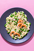 Risotto with prawns, chicken and peas