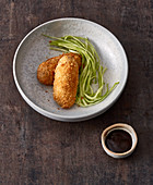 Japanese 'korokke' croquettes with white cabbage