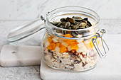 Overnight oats with yoghurt, pears and oranges