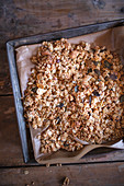 Homemade granola on a baking sheet