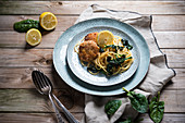 Lemon spaghetti with spinach and soya schnitzel (vegan)