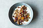 Seedy, fruity granola with a plant-based drink