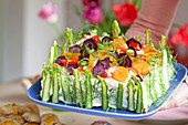A savoury cake with salmon and vegetables