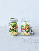 Chickpea and millet salad in glasses